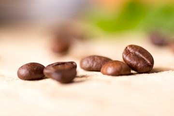 A close up of coffee beans on a table