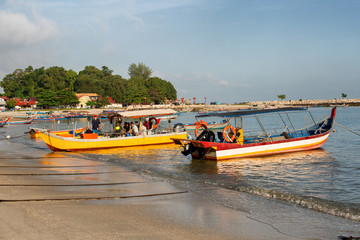 Fototapeta premium Timber fishing boats moored on the beach Penang