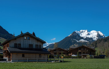 house in the farm with snow mountain view