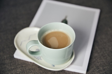 top view of white cup with fresh latte coffee 