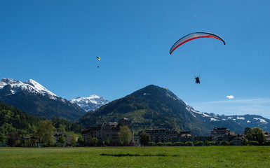 fly parachute in snow mountain view on blue sky.jpg