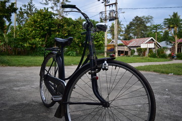 Fototapeta premium old bicycle in the village