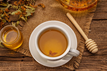 Linden tea. Dry fragrant flowers. Sunny morning breakfast. Hot drink to strengthen the immune system, alternative medicine