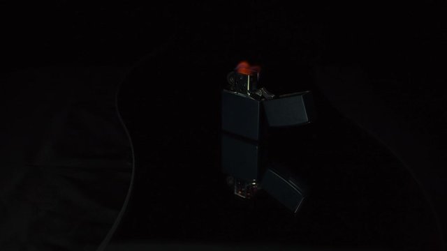 Zippo on a mirror fire extinguished. Fix. Color gradded