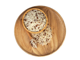 Three colors rice placed in a wooden tray, wooden spoon, wooden cup on a white background