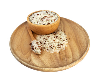 Three colors rice placed in a wooden tray, wooden spoon, wooden cup on a white background