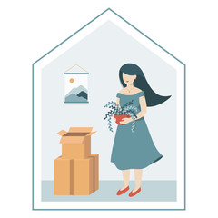 Woman moving to a new home. New dwelling and housewarming concept. Female unpacking belongings, unwrapping cardboard boxes, holding plant pot. Renting apartment or buying a house. Property purchase.