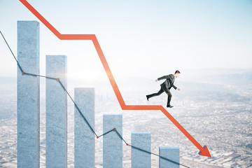 Businessman runs down on stock crash recession chart