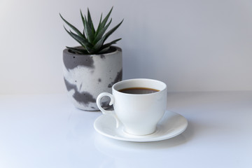 Cup of coffee on white background