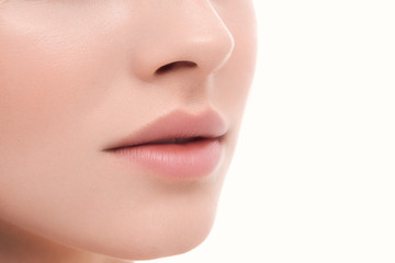 Closeup perfect natural lip makeup. Beautiful plump full lips on female face. Spa tender lips. Blank Space - obrazy, fototapety, plakaty