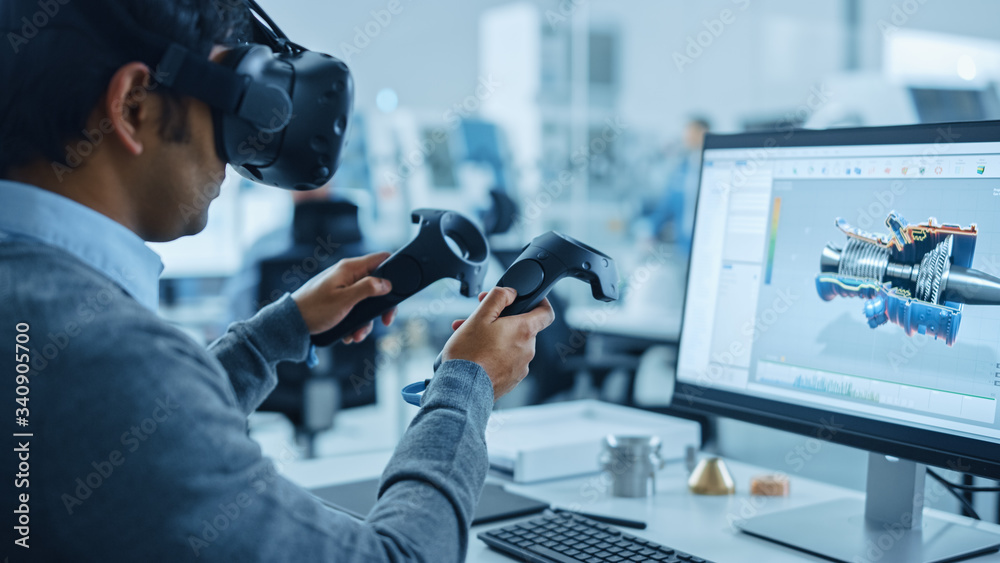 Fototapete modern industrial factory: mechanical engineer wearing virtual reality headset, holding controllers,