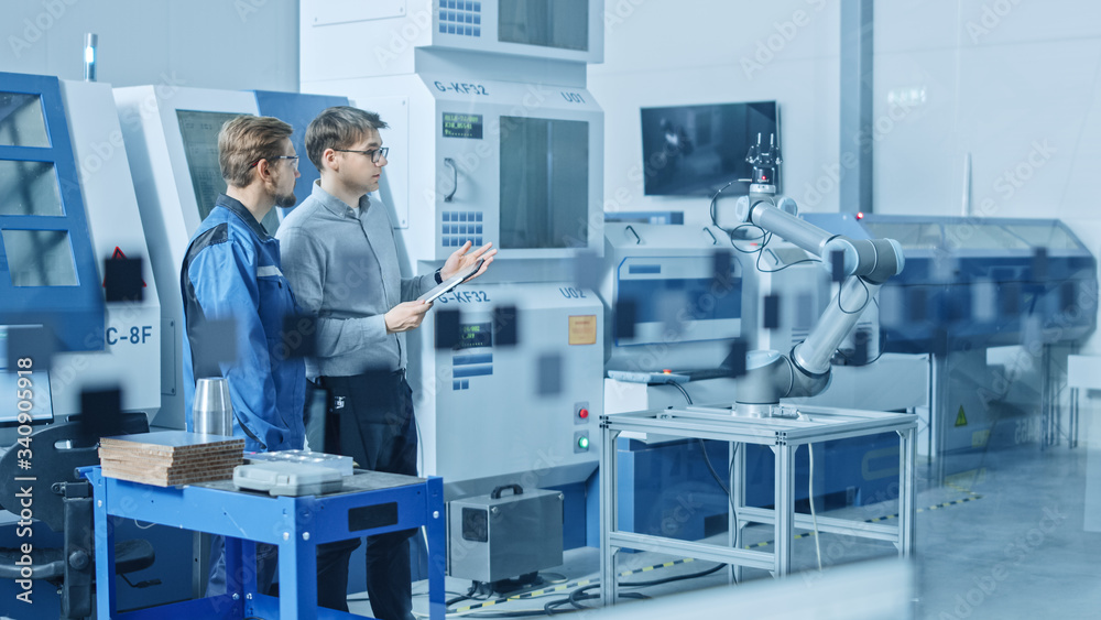 Poster In Factory Workshop: Workers Use High-Tech Industrial CNC Machinery, Robot Arm. Inside Office: Digital Engineering Professional Working on Personal Computer, Designing 3D Component in CAD Software