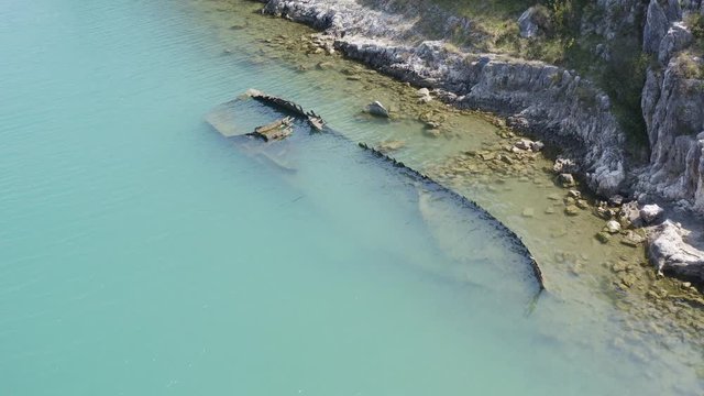 an aerial view of the sinking German ship Fritz from World War II in the bay of Salamustica in the Rasa bay, Istria, Croatia
