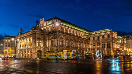 Fototapeta na wymiar vienna state opera house in austria at night. popular tourist destination in beautiful street light. 
