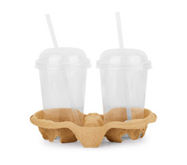 Two take-out empty glasses for coffee in holder on a white background