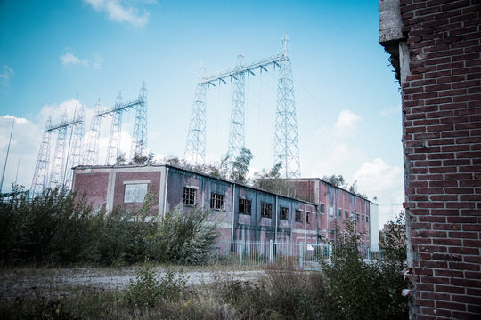 Abandoned buildings near power plant