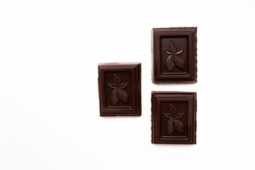 Three pieces of chocolate isolated on white background