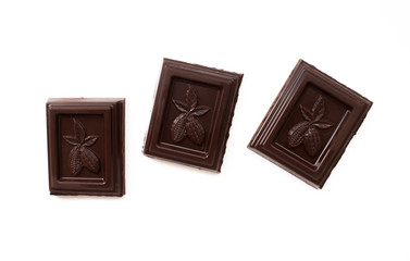 Three pieces of chocolate isolated on white background