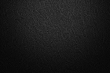 Black textured paper background