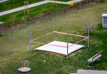 Playgrounds & parks & many public areas have now been closed due to the corona virus pandemic in Vienna. The photo of this sandbox is in the district of Favoriten, in the capital of Austria.