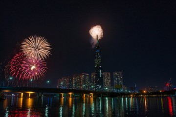 High resolution image of colorful fireworks of Ho Chi Minh City at new year 2020 view from Landmark 81 riverside.