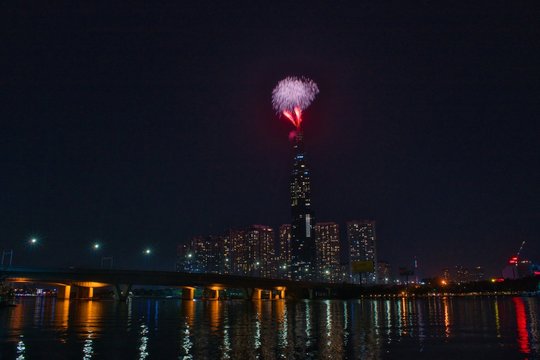 High resolution image of colorful fireworks of Ho Chi Minh City at new year 2020 view from Landmark 81 riverside.