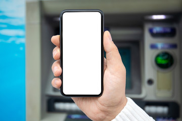 male hand holds phone with isolated screen background of ATM