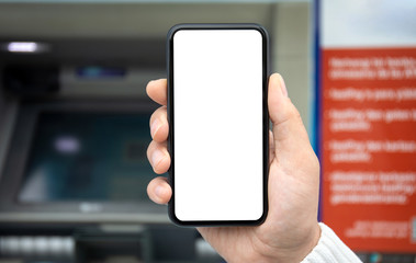 male hand holds phone with isolated screen background of ATM