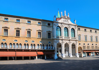 Fototapeta na wymiar Scenic view of Palazzo del Monte di Pieta with Church of San Vincenzo, Vicenza, Italy