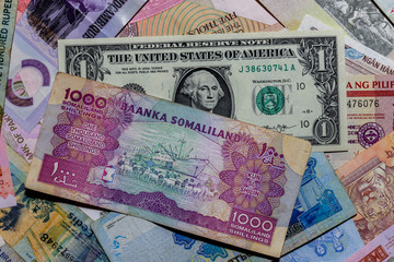 Fototapeta na wymiar Moscow, Russia - April 20, 2020: One US Dollar with Different Somaliland Shilling Banknotes