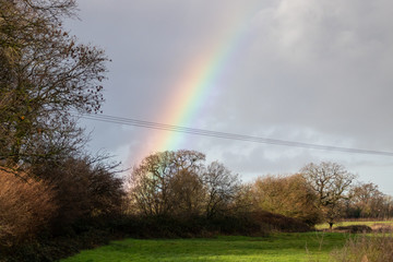 a rainbow in the English countryside