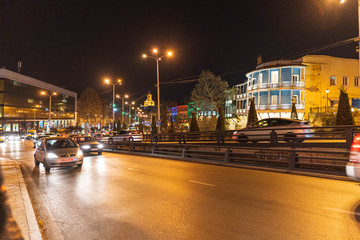 Christmas night city with a lot of lights and decoration