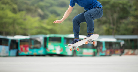 Skateboarder legs skateboarding at outdoors