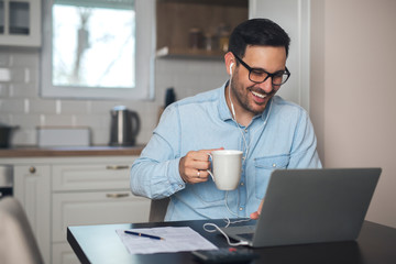 Man having video call on laptop