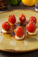 Salted red cherry tomatoes on bread