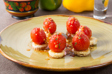 Salted red cherry tomatoes on bread
