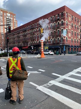 Worker Waiting To Cross Street, Manhattan, New York