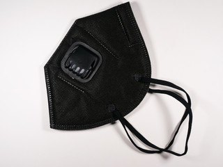 Close up, Cloth face mask with vents for use to protect against germs and viruses.