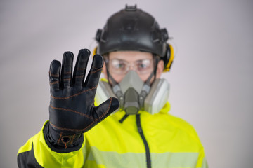 A man standing at the post does not allow to pass, a checkpoint, there is no passage.