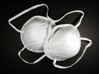 Close up, N95 white mask is used for germ and virus protection.