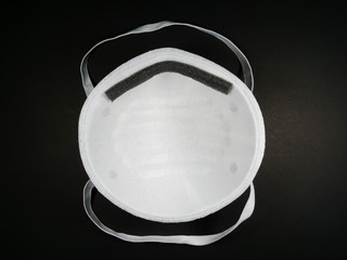 Close up, N95 white mask is used for germ and virus protection.