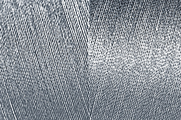 Shiny silver thread textured background