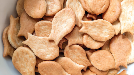 figured salt crackers bakery fish on plate