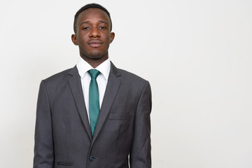 Portrait of young African businessman in suit