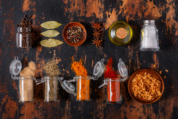 Set of spices on a wooden background. Top view.