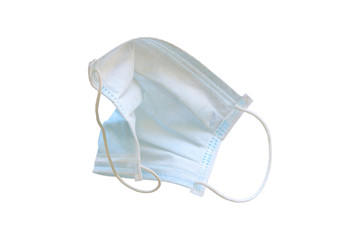 Used blue medical surgical mask, Medical protective mask on white background. Disposable surgical face mask cover the mouth and nose. Selective focus.