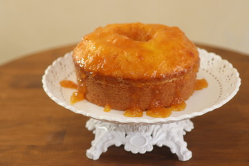 Homemade orange cake with orange icing. 