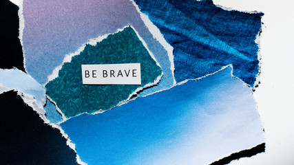 cutout collage, artistic picture with the inscription be brave
