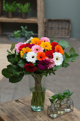 Flower bouquet in a vase in interior