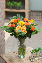 Flower bouquet in a vase in interior